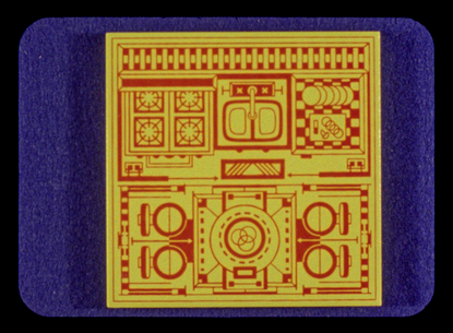 A yellow box with red designs sits over purple.